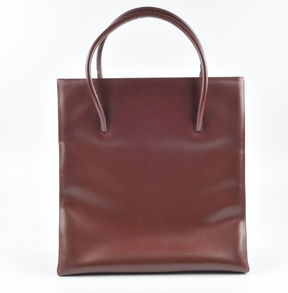 CARTIER - a Must De Cartier Bordeaux tote handbag. Designed with a tall rigid rectangular shape - Image 2 of 5