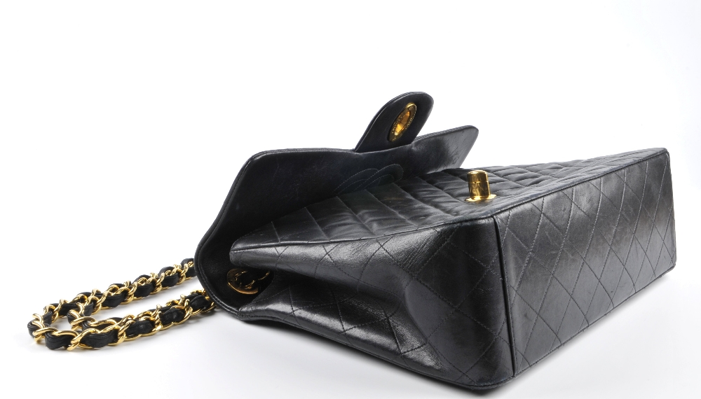 CHANEL - a Maxi Classic Flap handbag. Featuring maker's signature black quilted lambskin leather - Image 6 of 6