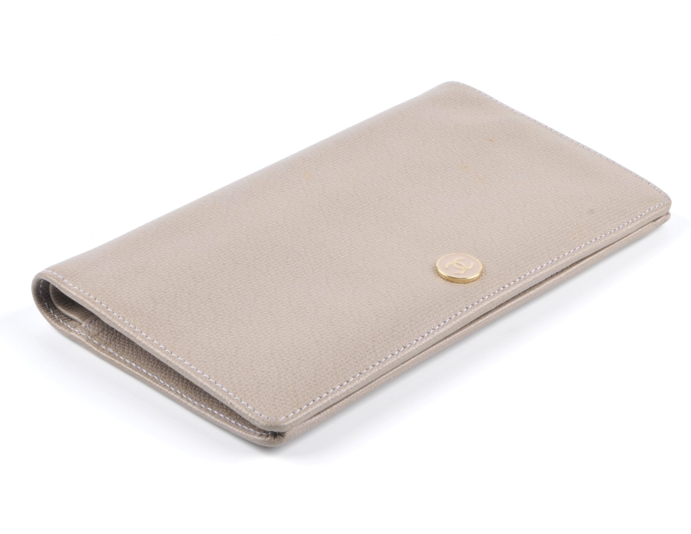 CHANEL - a grey bi-fold wallet. The grained grey leather exterior with enamel button with 'CC' - Image 3 of 4