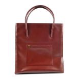 CARTIER - a Must De Cartier Bordeaux tote handbag. Designed with a tall rigid rectangular shape