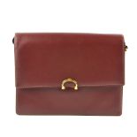 CARTIER - a Bordeaux leather satchel. Crafted from maker's classic burgundy leather, featuring