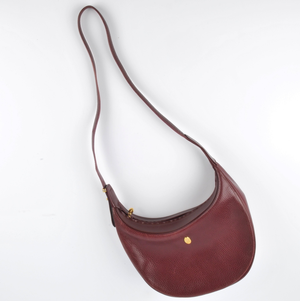 CARTIER - a Bordeaux leather hobo handbag. Featuring a burgundy textured leather exterior with a - Image 4 of 5