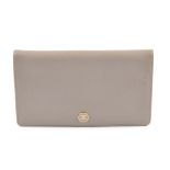 CHANEL - a grey bi-fold wallet. The grained grey leather exterior with enamel button with 'CC'