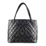 CHANEL - an early 90s quilted leather tote handbag. Featuring maker's iconic black lambskin