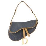 CHRISTIAN DIOR - a blue denim saddle bag. Featuring a blue denim exterior with beige smooth