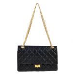 CHANEL - a Reissue Quilted Classic Flap handbag. Designed with a black crinkled calfskin leather