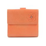 CHANEL - a Camellia wallet. The coral-tone leather with embossed flower and 'CC' logo in applied