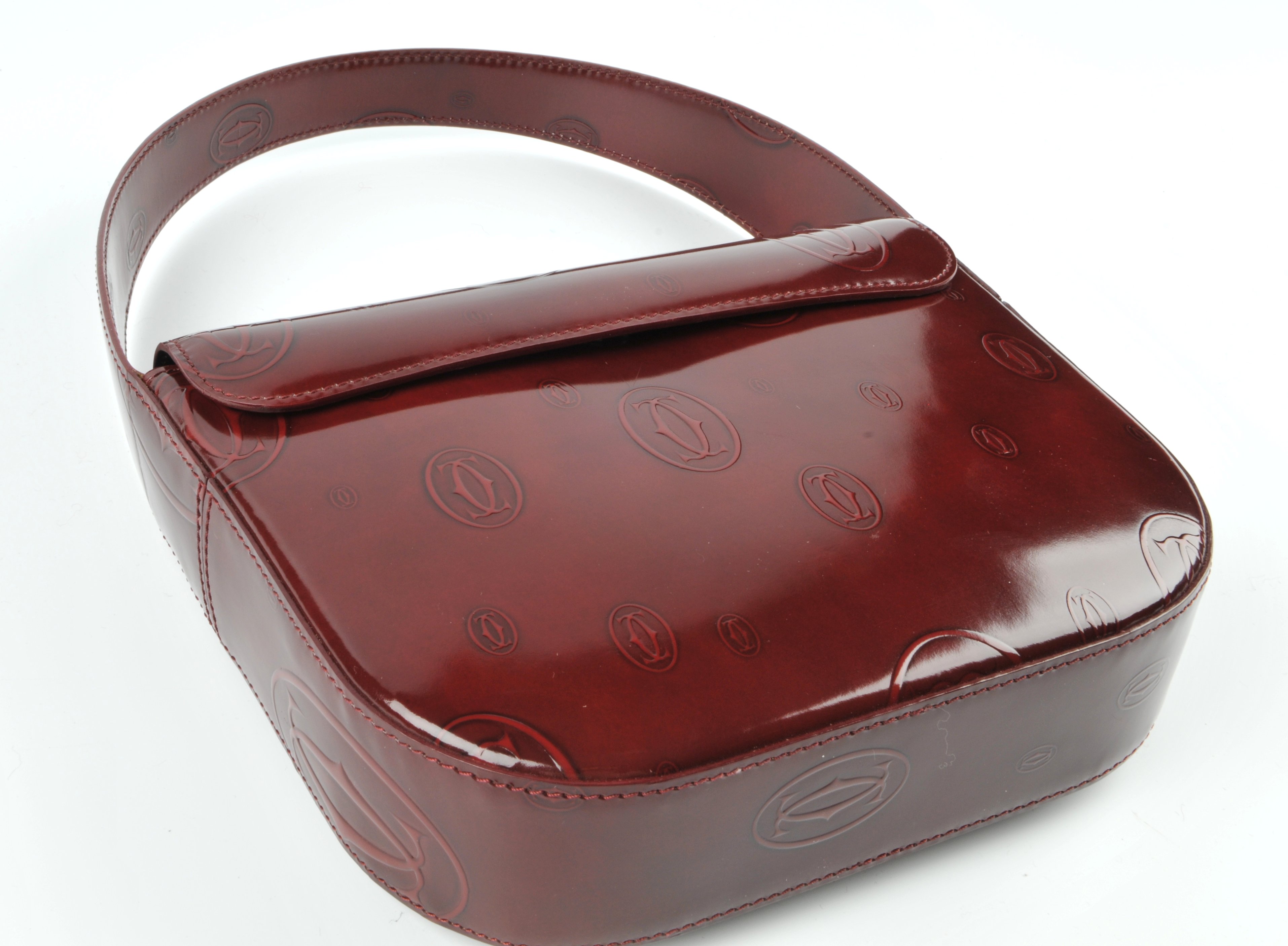 CARTIER - a Happy Birthday Bordeaux handbag. Designed with a structured shape, burgundy monogram - Image 4 of 5