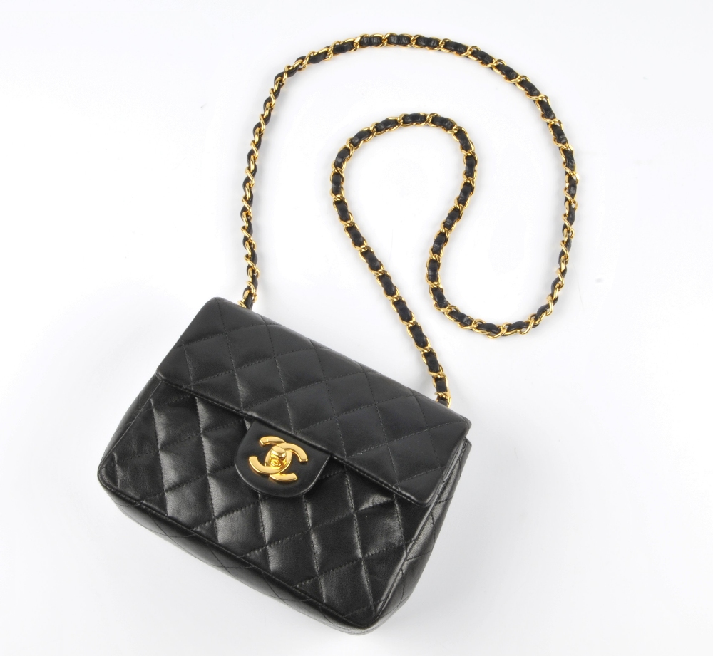 CHANEL - a Mini Classic Flap handbag. Featuring maker's signature black quilted lambskin leather - Image 4 of 7