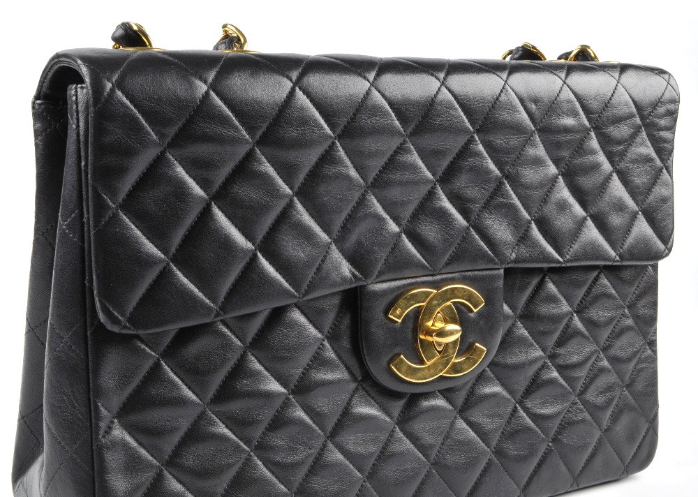 CHANEL - a Maxi Classic Flap handbag. Featuring maker's signature black quilted lambskin leather - Image 3 of 6