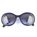 CHANEL - a pair of sunglasses. Designed with wide round dark blue acetate frames, oversized blue