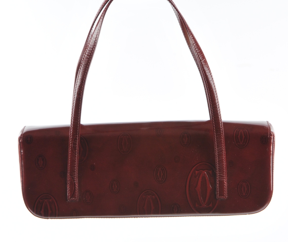 CARTIER - a Happy Birthday long baguette bag. Crafted from burgundy patent leather embossed with - Image 2 of 4