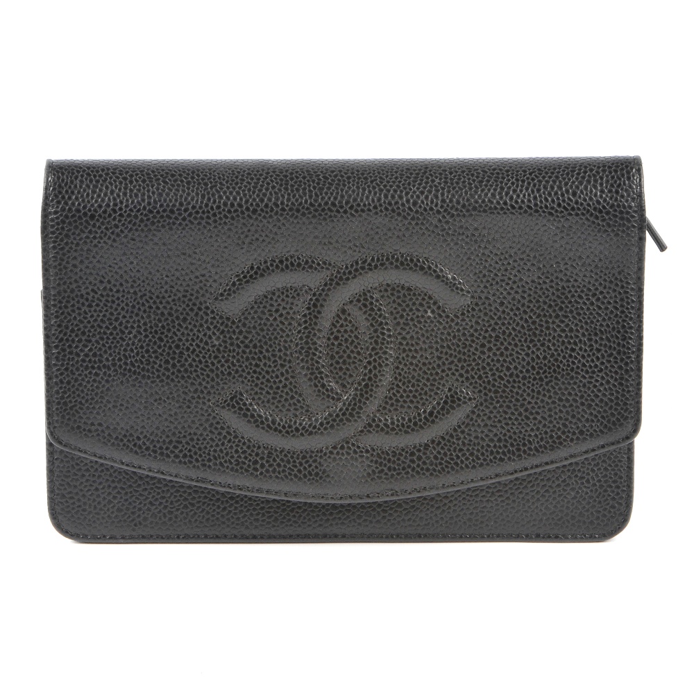 CHANEL - a caviar leather purse with chain. Featuring a black caviar leather exterior with raised CC