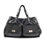 CHANEL - a black leather Pocket-in-the-City large tote handbag. Featuring a durable, soft glazed