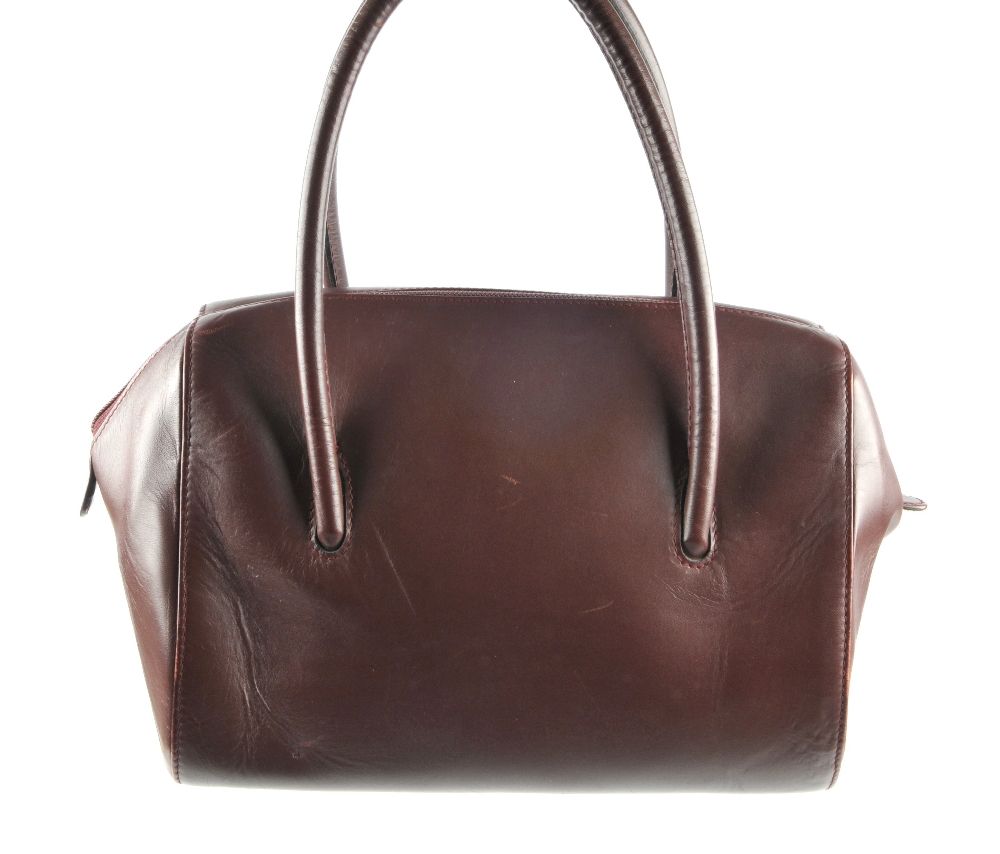 CARTIER - a Bordeaux Boston handbag. Featuring double thin looping handles, top zip fastening, - Image 3 of 5