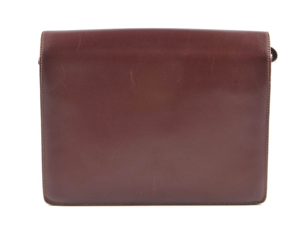 CARTIER - a Bordeaux leather handbag. Featuring maker's signature burgundy leather exterior, - Image 2 of 7