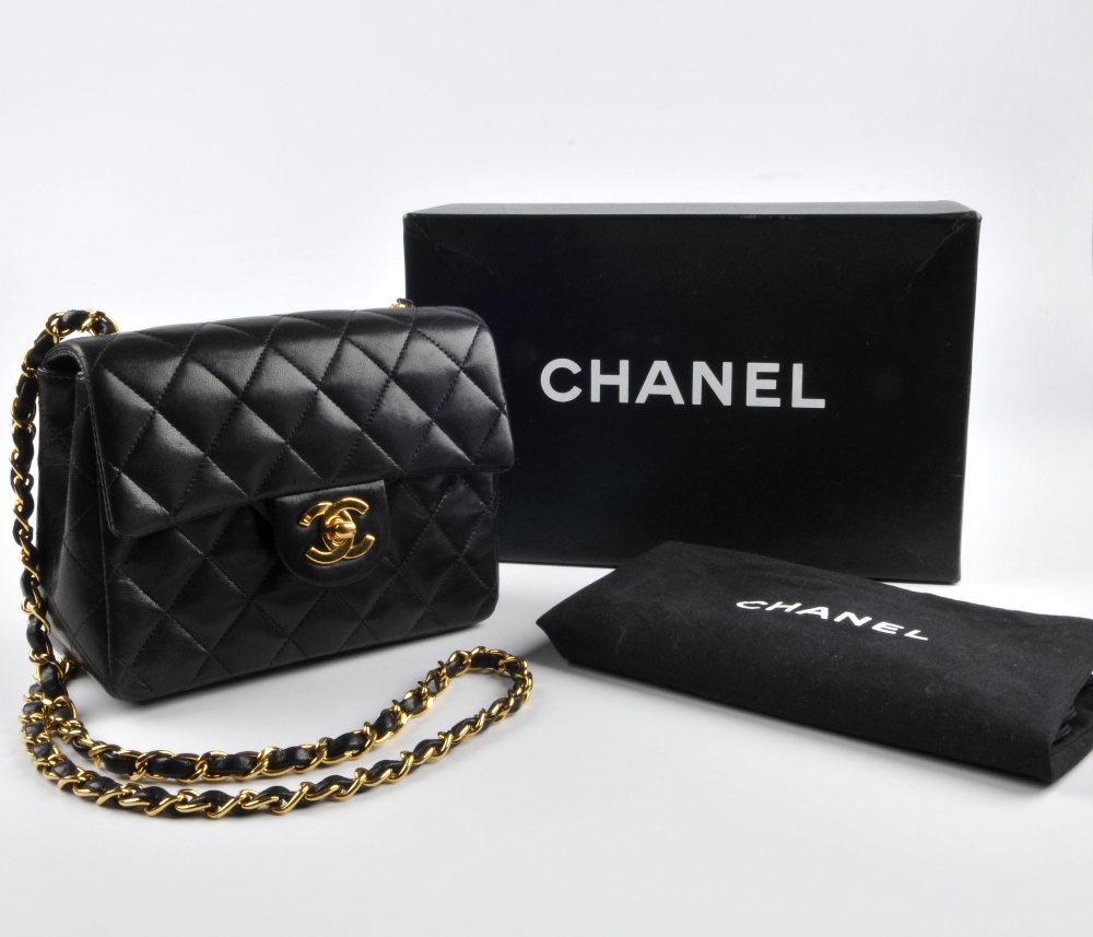 CHANEL - a Mini Classic Flap handbag. Featuring maker's signature black quilted lambskin leather - Image 7 of 7