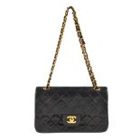CHANEL - a Small Classic Double Flap handbag. Featuring maker's iconic black quilted lambskin