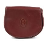 CARTIER - a Bordeaux leather crossbody handbag. Designed with a single adjustable crossbody strap,