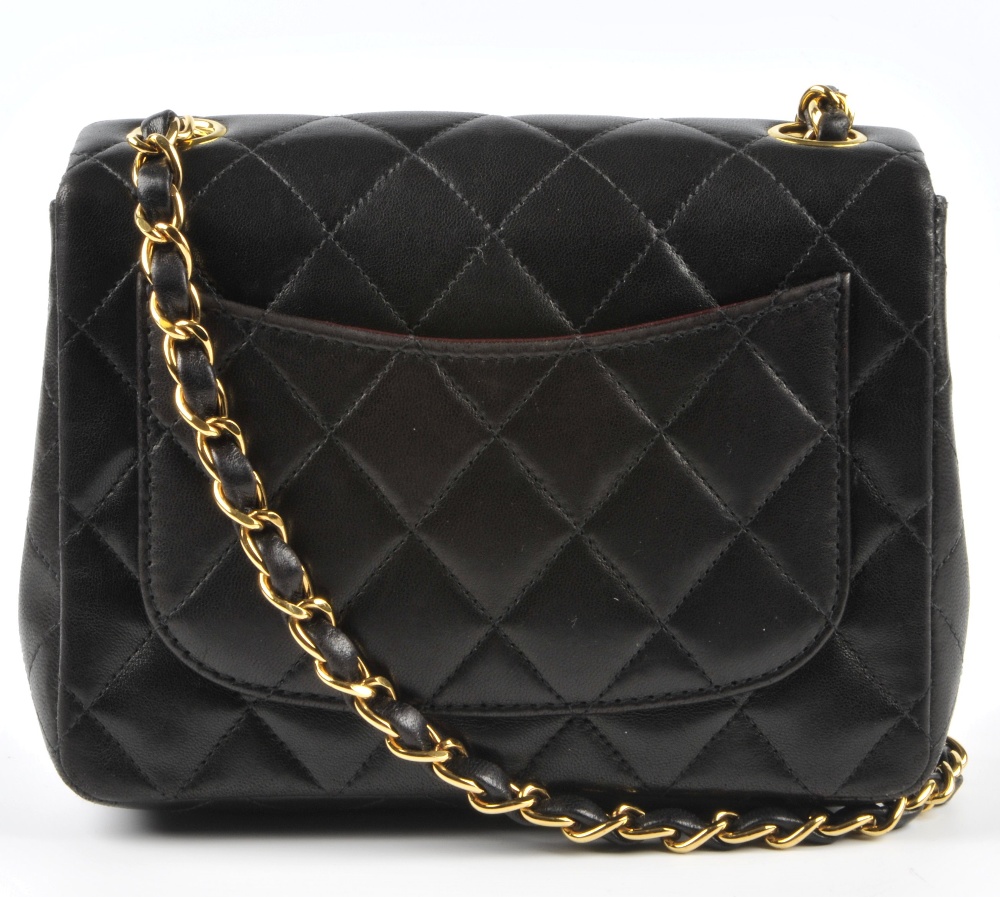 CHANEL - a Mini Classic Flap handbag. Featuring maker's signature black quilted lambskin leather - Image 3 of 7