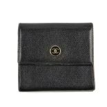 CHANEL - a leather wallet. Designed in black leather with two outer flap pockets, both fastening