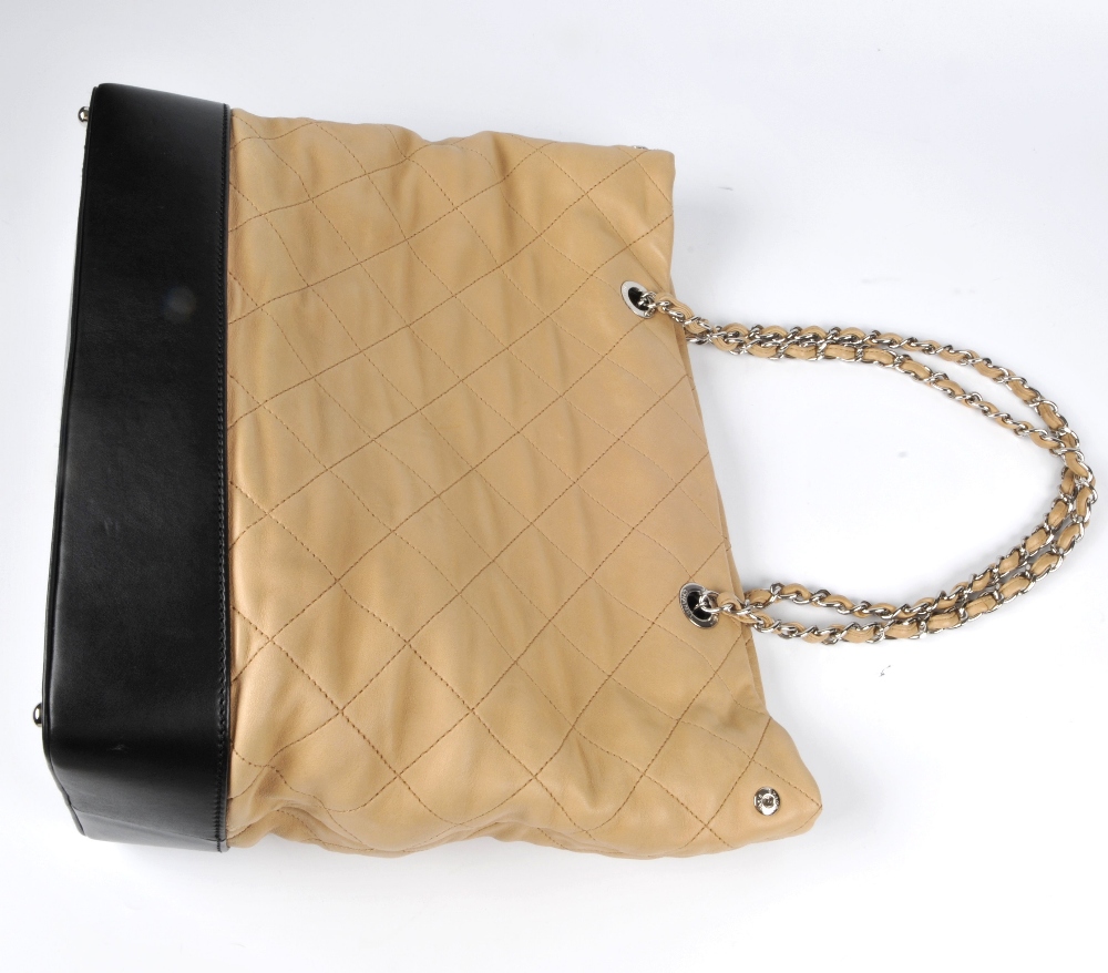 CHANEL - a quilted tote bag. Featuring a beige quilted leather exterior with a smooth black - Image 3 of 3