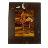 A natural amber plaque. The rectangular wooden mount, with a panel of natural amber pieces