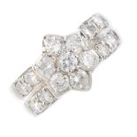 A platinum diamond dress ring. The brilliant-cut diamond floral cluster, with similarly-cut