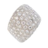 A diamond dress ring. Designed as a pave-set diamond asymmetric panel. Estimated total diamond