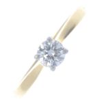 An 18ct gold diamond single-stone ring. The brilliant-cut diamond, with tapered shoulders and