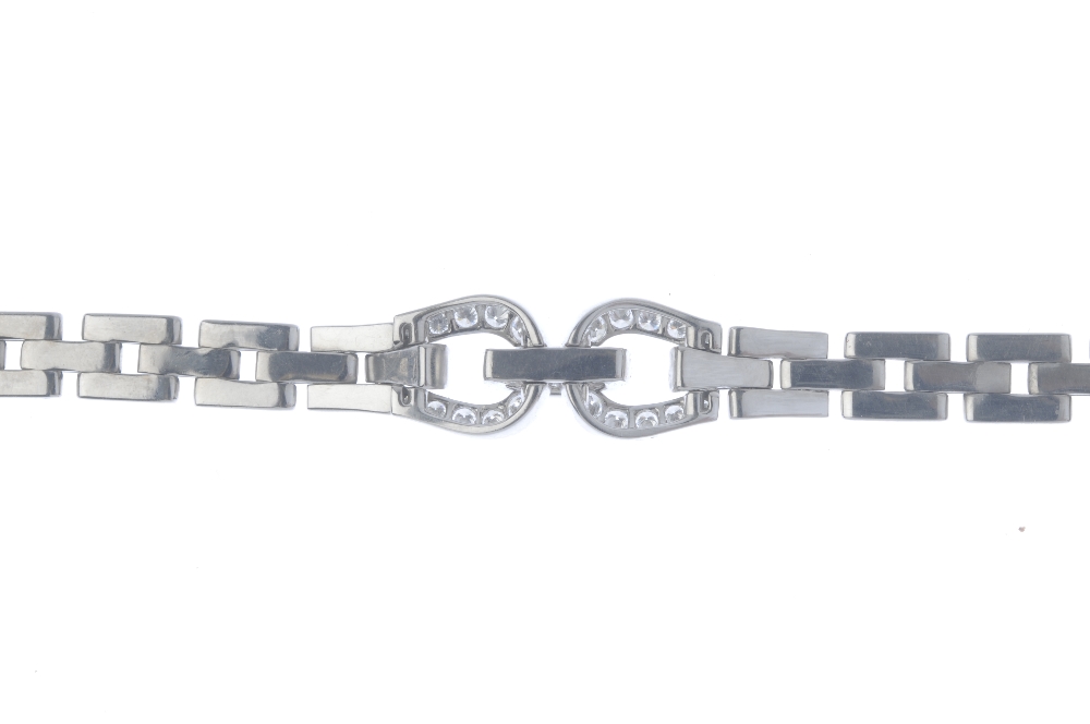 CARTIER - a diamond bracelet. The brilliant-cut diamond loops and connecting bar, with brick-link - Image 2 of 3