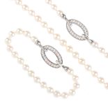 A set of cultured pearl and diamond jewellery. The necklace designed as a series of cultured pearls,