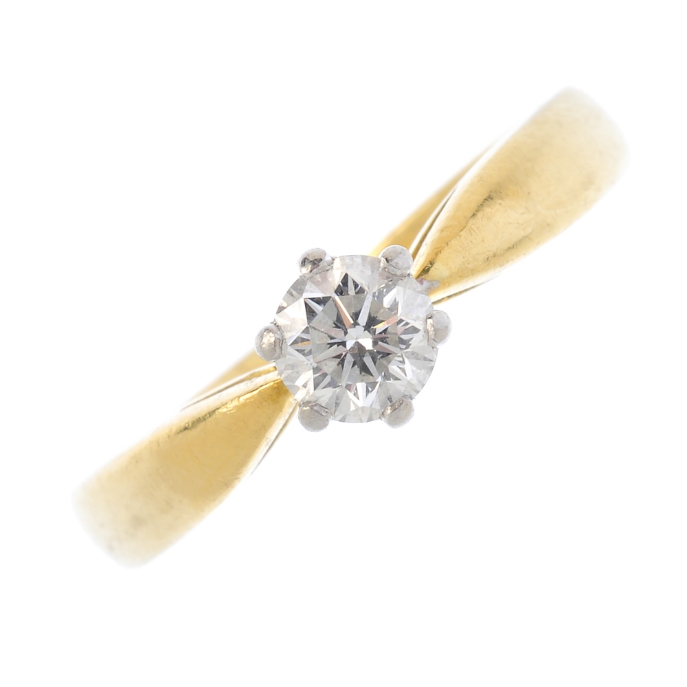 An 18ct gold diamond single-stone ring. The brilliant-cut diamond, with tapered band. Estimated