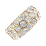 BOODLES & DUNTHORNE - an 18ct gold diamond dress ring. Designed as three graduated brilliant-cut