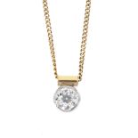 A diamond pendant. Of bi-colour design, the circular-cut diamond partial collet, suspended from a