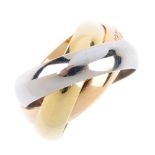 CARTIER - an 18ct gold 'Trinity' ring. The three, tri-colour, interwoven bands, with Cartier