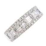 A diamond dress ring. The alternating square-shape and twin baguette-cut diamond line, with