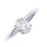 A diamond single-stone ring. The oval-shape diamond, with tapered band. Estimated diamond weight 0.