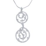An 18ct gold diamond pendant. Designed as a brilliant-cut diamond barbed vine scroll, suspended from