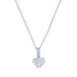 A diamond pendant. The heart-shape diamond, suspended from a tapered baguette-cut diamond surmount