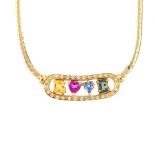 A multi-gem necklace. The fancy-shape ruby and vari-hue sapphire line spelling 'Love', within a