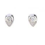 A pair of 18ct gold diamond stud earrings. Each of pear-shape outline, the brilliant-cut diamond,
