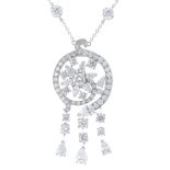 A platinum diamond necklace. Of openwork design, the pear-shape and brilliant-cut diamond fringe,