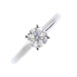 A diamond single-stone ring. The brilliant-cut diamond, with plain band. Estimated diamond weight