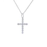 TIFFANY & CO. - a diamond cross pendant. The brilliant-cut diamond cross, suspended from a