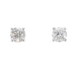 A pair of brilliant-cut diamond stud earrings. Estimated total diamond weight 2cts, J-K colour, P2