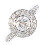 An 18ct gold diamond ring. Designed as a brilliant-cut diamond collet, to the similarly-cut