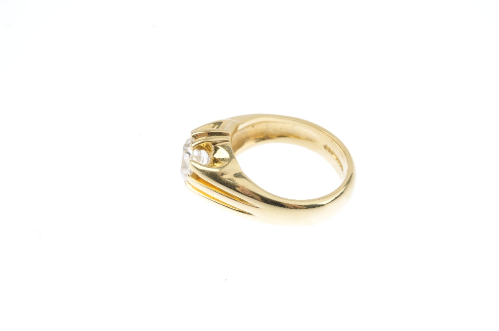 A gentleman's 18ct gold diamond single-stone ring. The brilliant-cut diamond, with grooved sides and - Image 2 of 3