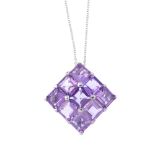 An 18ct gold amethyst pendant. The pave-set amethyst kite-shape panel, suspended from a trace-link