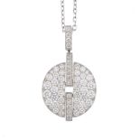 CARTIER - a diamond pendant and chain. The pave-set diamond disc, with brilliant-cut diamond central